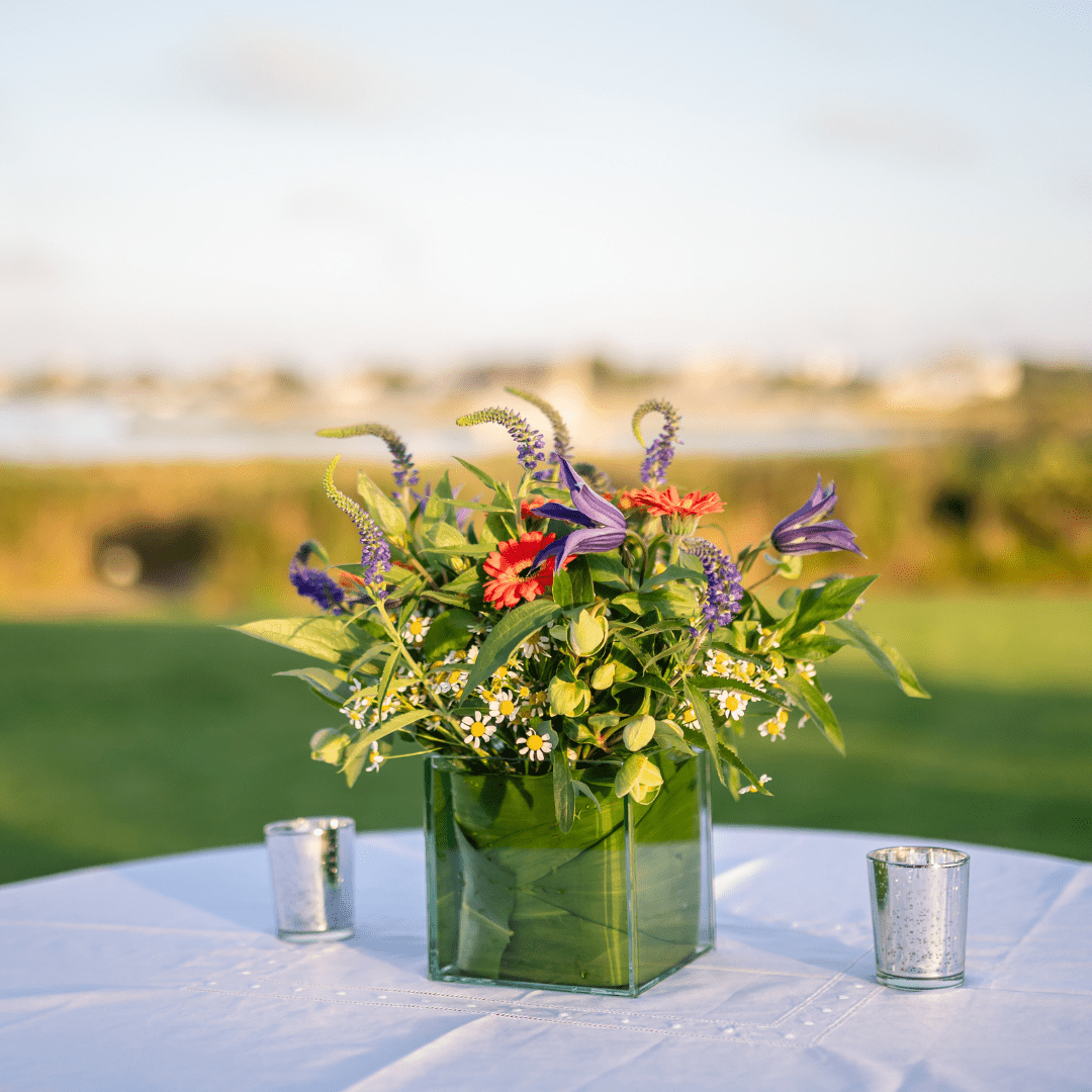 Square garden inspired floral arrangement featuring seasonal wildflowers