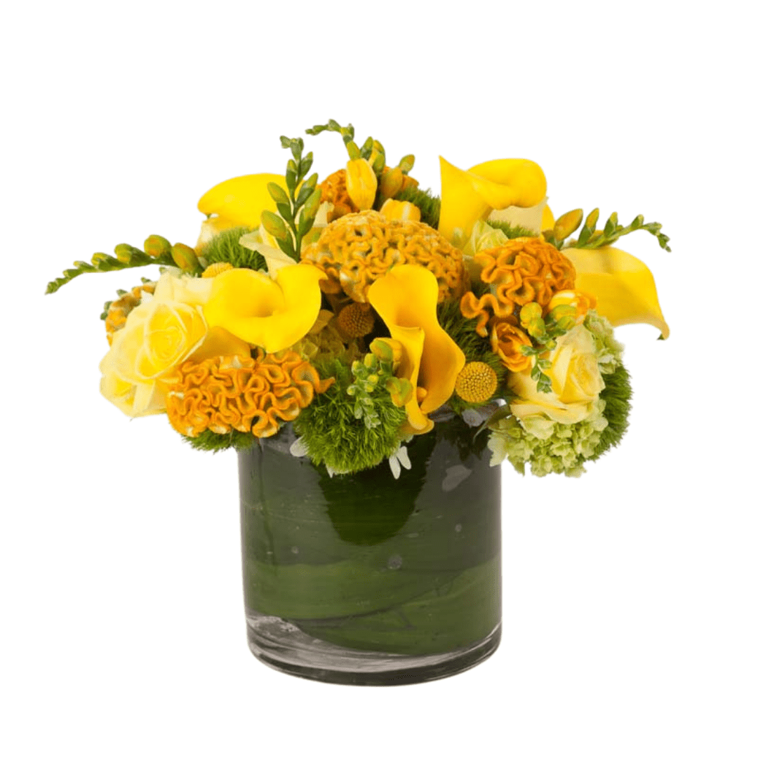 Floral arrangement featuring yellow Celosia, Calla Lilies & Freesia