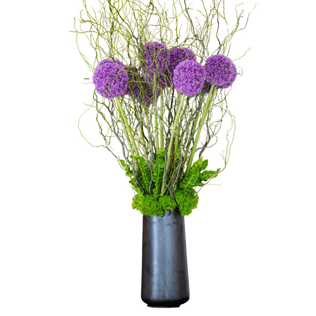 Large lobby floral arrangement featuring purple Allium
